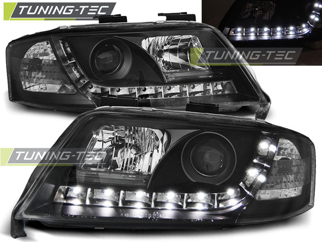 Phares de jour noirs compatibles avec Audi A6 97-01