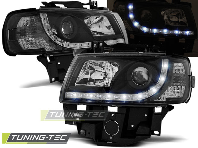 Phares avant noirs à feux de jour compatibles avec VW T4 (08.96-03.03)