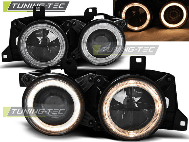 Phares Angel Eyes noirs compatibles BMW E32/E34
