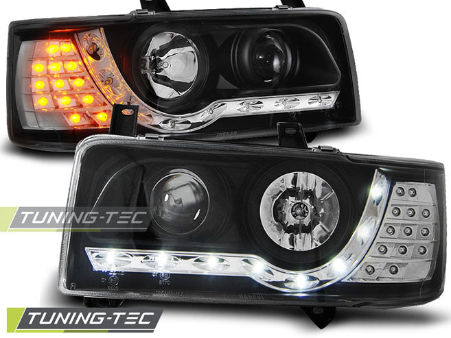 Phares avant noirs à feux de jour compatibles avec VW T4 Transporter (1990-2003).