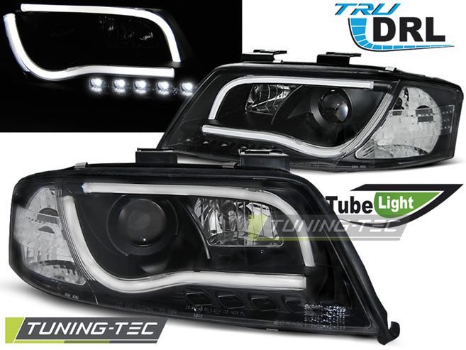 Phares tubulaires avec feux de jour noirs compatibles avec Audi A6 06.01-05.04